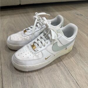 Nike White and Gold Sneakers with Gray Accents